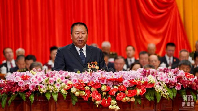 △谷祥峰在庆祝大会上发言。（总台记者李晋拍摄）